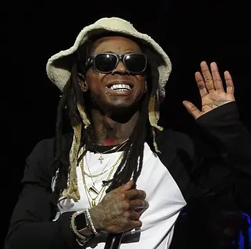 Why Did Lil Wayne Go to Jail? Exploring His Gun Charges - Prison Insight